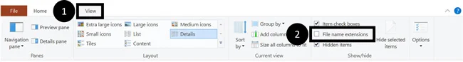 To hide your file extension names, in the file explorer window click the view tab and unselect file name extensions