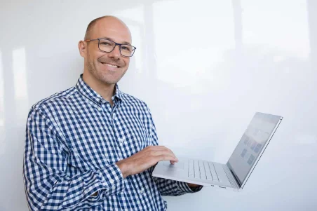 Taylor working on a computer